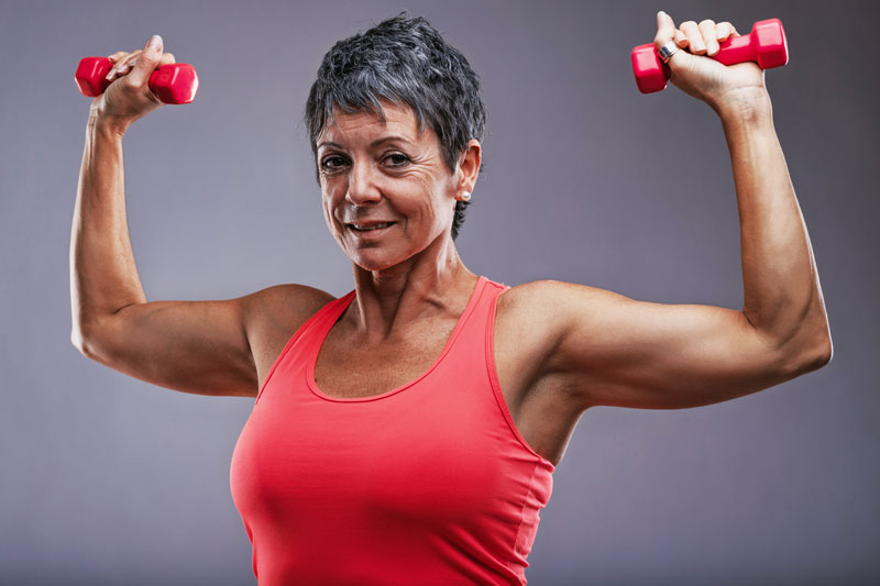 woman doing overhead arm raises